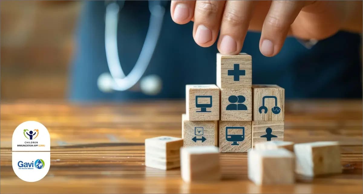 A hand stacking health icon to represent CIMA's impact on immunization infrastructure.