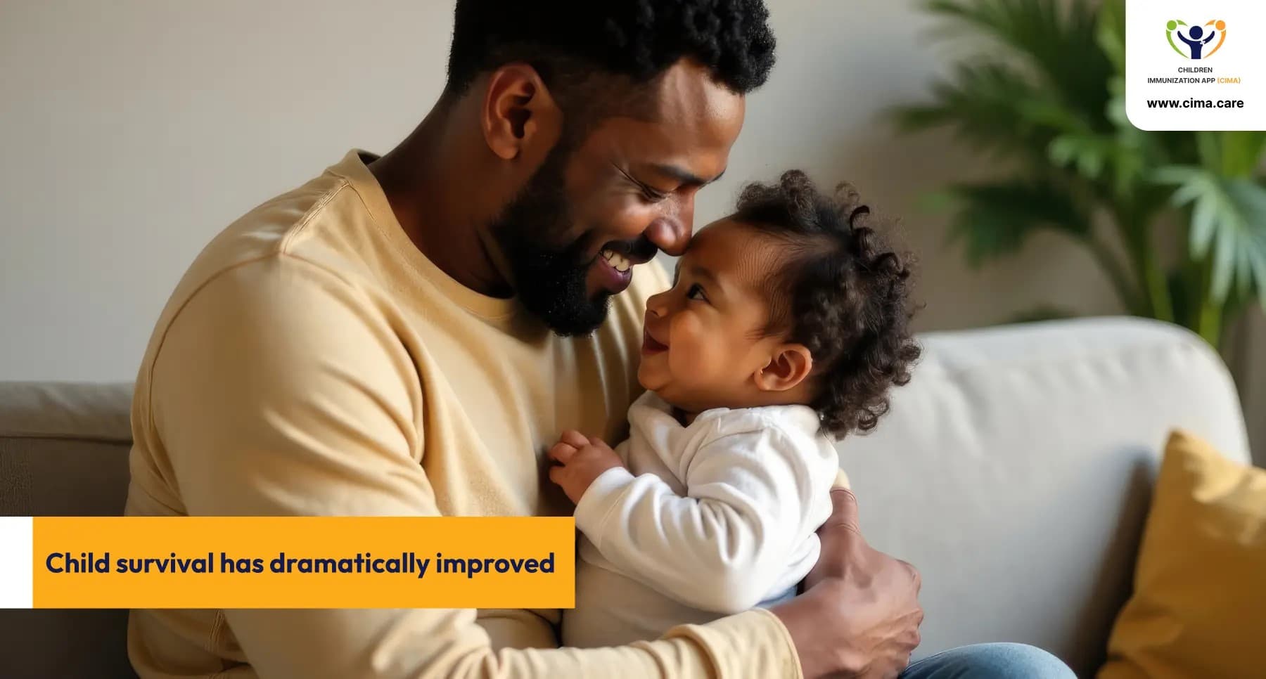 A happy father holding a healthy toddler, showing improved child survival.